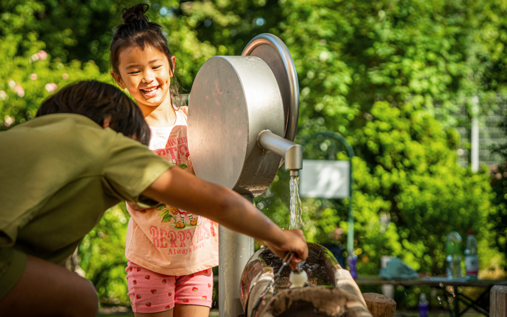 Child with water pump